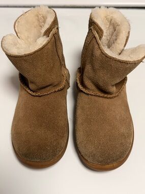 Baby Uggs with velcro sides.